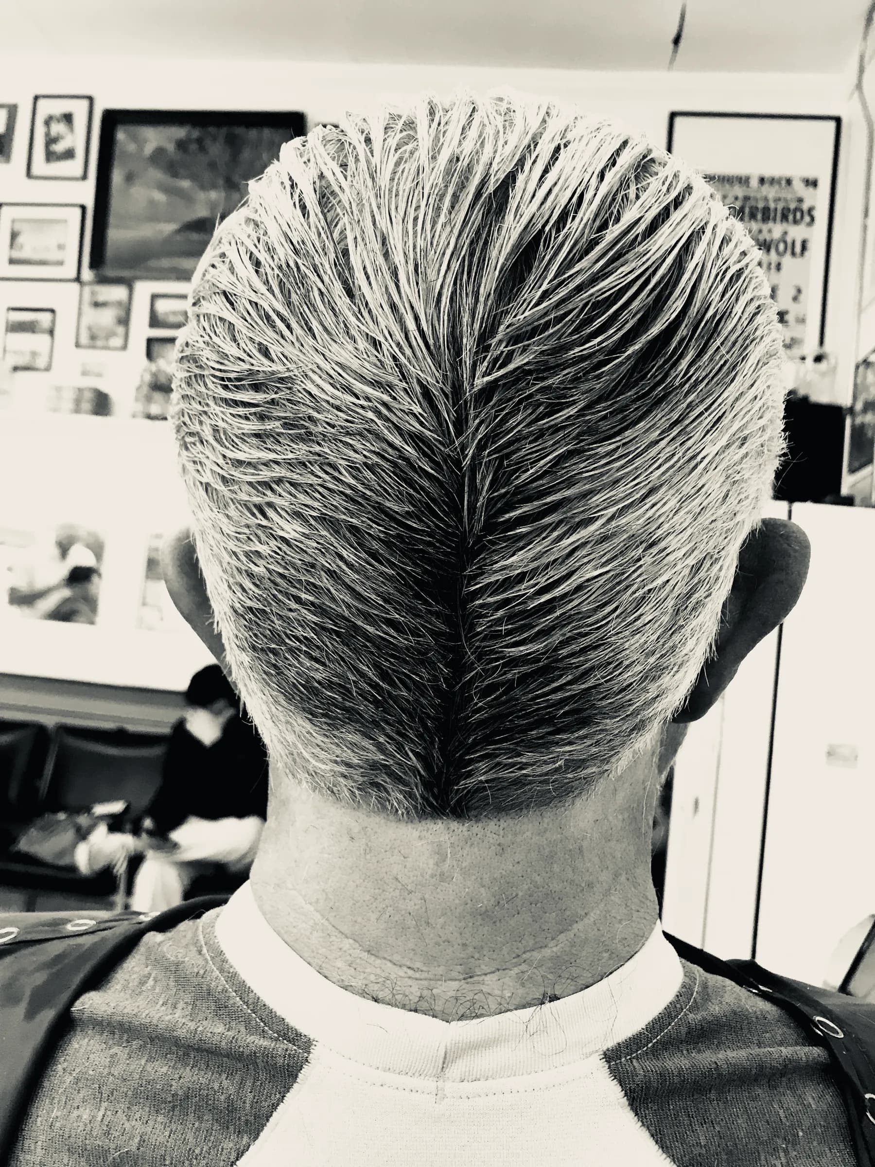 Precision haircut with a sharp neckline by Jake